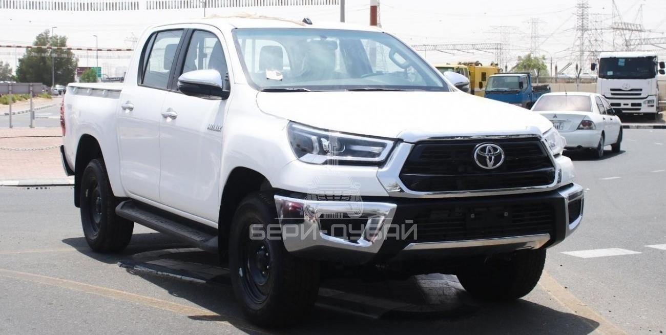 Toyota Hilux 2.4L diesel  . White 2022 model, M/T Wide body with Chrome bumper