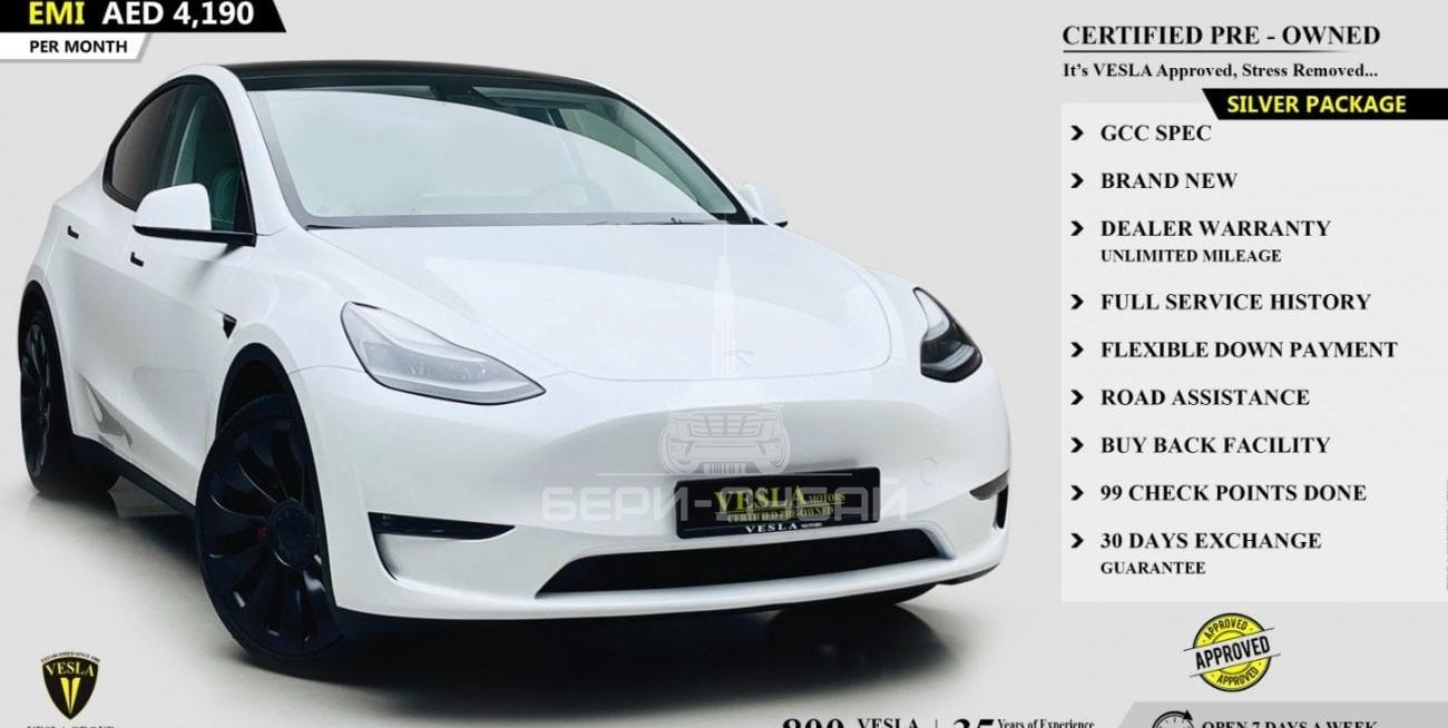 Tesla Model Y 2022 / GCC / DUAL MOTORS + PERFORMANCE + CARBON FIBER / DEALER WARRANTY UNTIL 80.000KMS / 4,190 DHS
